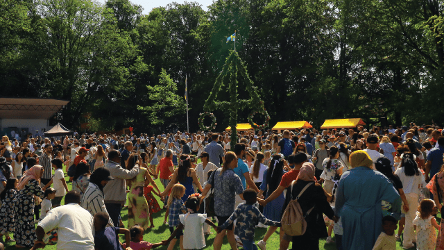 A crowd dances at a midsummer celebration in Linköping, Sweden, on June 20, 2025. (Pradeep Dambarage/Nurphoto via Getty Images)