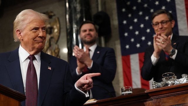 Vice President JD Vance and House Speaker Mike Johnson applaud during President Donald Trump's address to a joint session of Congress on March 4, 2025. (Win McNamee/Getty Images)