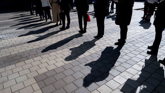 Job seekers wait in line to enter a job fair event in Silver Spring, Maryland, on April 16, 2025. (Roberto Schmidt/AFP via Getty Images)