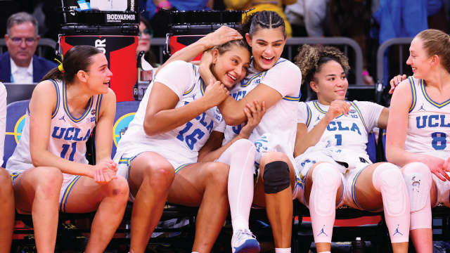 Sisters Lauren and Sienna Betts of the UCLA Bruins hug in the final minutes of the NCAA women's basketball championship game against the South Carolina Gamecocks at Mortgage Matchup Center on April 5 in Phoenix. (C. Morgan Engel/NCAA Photos via Getty Images)