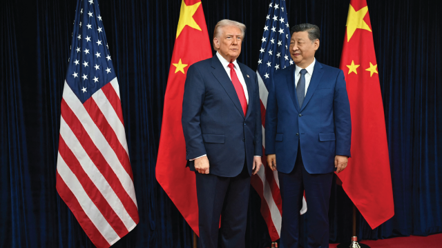 U.S. President Donald Trump and Chinese President Xi Jinping arrive for trade talks at Gimhae Air Base, near Busan, South Korea, on Oct. 30, 2025. (Andrew Caballero-Reynolds/AFP via Getty Images)