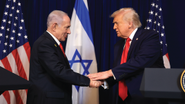 U.S. President Donald Trump and Israeli Prime Minister Benjamin Netanyahu shake hands during a press conference at Trump's Mar-a-Lago club in Palm Beach, Florida, on Dec. 29, 2025. (Joe Raedle/Getty Images)