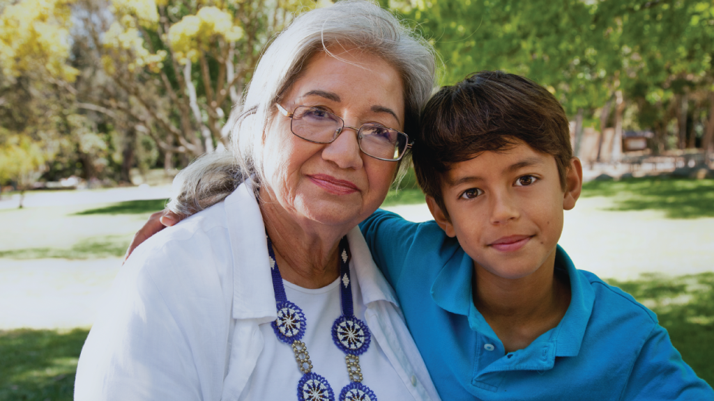 A portrait of a Hispanic grandmother and her grandson (Ron Levine/Getty Images)