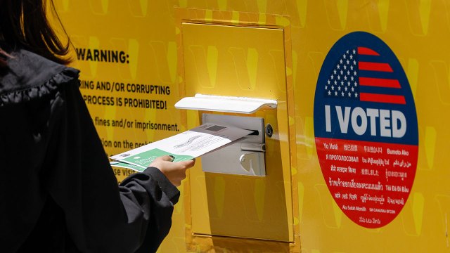 A person drops off a mail-in ballot during early voting outside the Los Angeles County Registrar-Recorder building on June 1, 2026, in Norwalk, California. (Ronaldo Bolaños/Los Angeles Times via Getty Images)