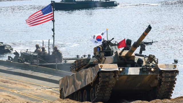 A South Korean army tank leaves a pontoon bridge after crossing the Imjin River during a joint U.S.-South Korea military exercise in the border town of Yeoncheon on March 20, 2025. (Kim Jae-Hwan/SOPA Images/LightRocket via Getty Images)