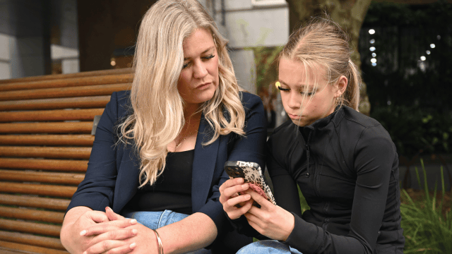Ava Chanel Jones, a 12-year-old Australian social media influencer, with her mother in Melbourne, Australia, on Nov. 18, 2025. (William West/AFP via Getty Images)