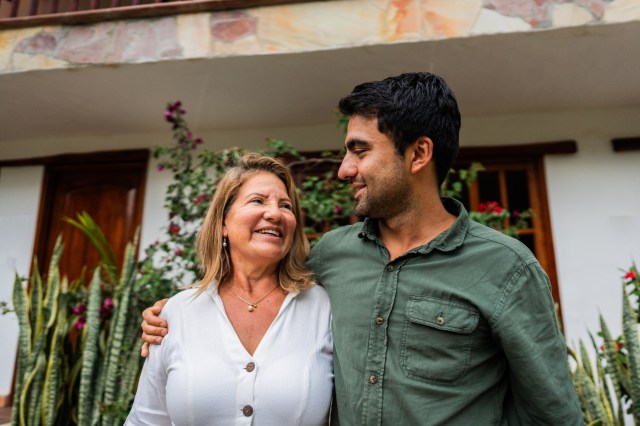 Mother and son talking in the backyard