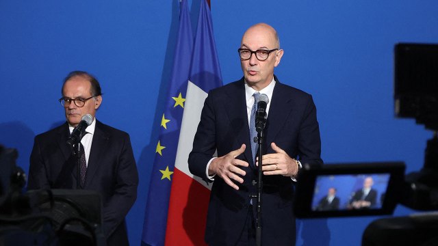 France's Minister of the Economy, Finance and Industrial, Energy and Digital Sovereignty Roland Lescure, right, and Bank of France Governor Emmanuel Moulin speak to the press on Sept. 15, 2026.
