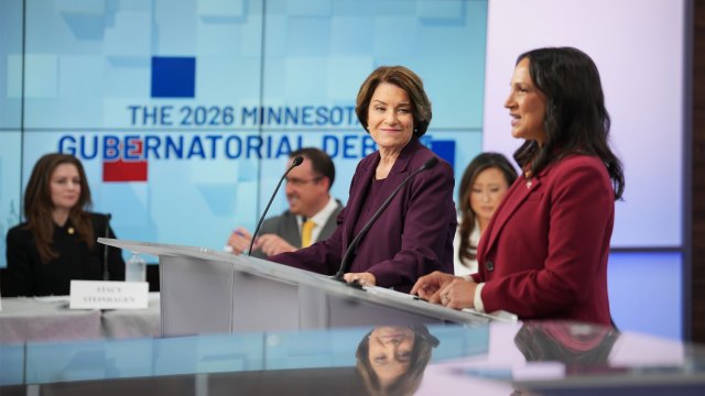 Democratic Minnesota gubernatorial candidate U.S. Sen. Amy Klobuchar listens as her opponent, GOP state House Speaker Lisa Demuth, speaks during a debate on Oct. 21, 2026, at the KTTC/KXLT studio in Rochester, Minnesota. The winner of their election will be the state's first woman governor. (Jeff Wheeler/The Minnesota Star Tribune via Getty Images)