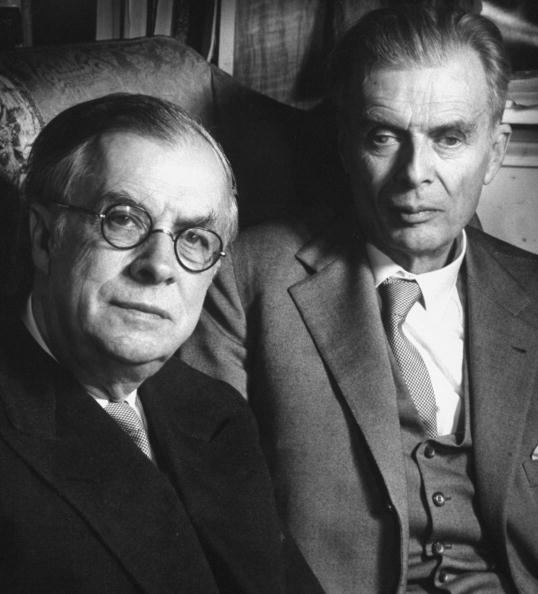 Scientist Dr. Julian Huxley (L) sitting in same armchair w. his brother, author Aldous Huxley. Photo by Wolf Suschitzky/Pix Inc./The LIFE Images Collection/Getty Images